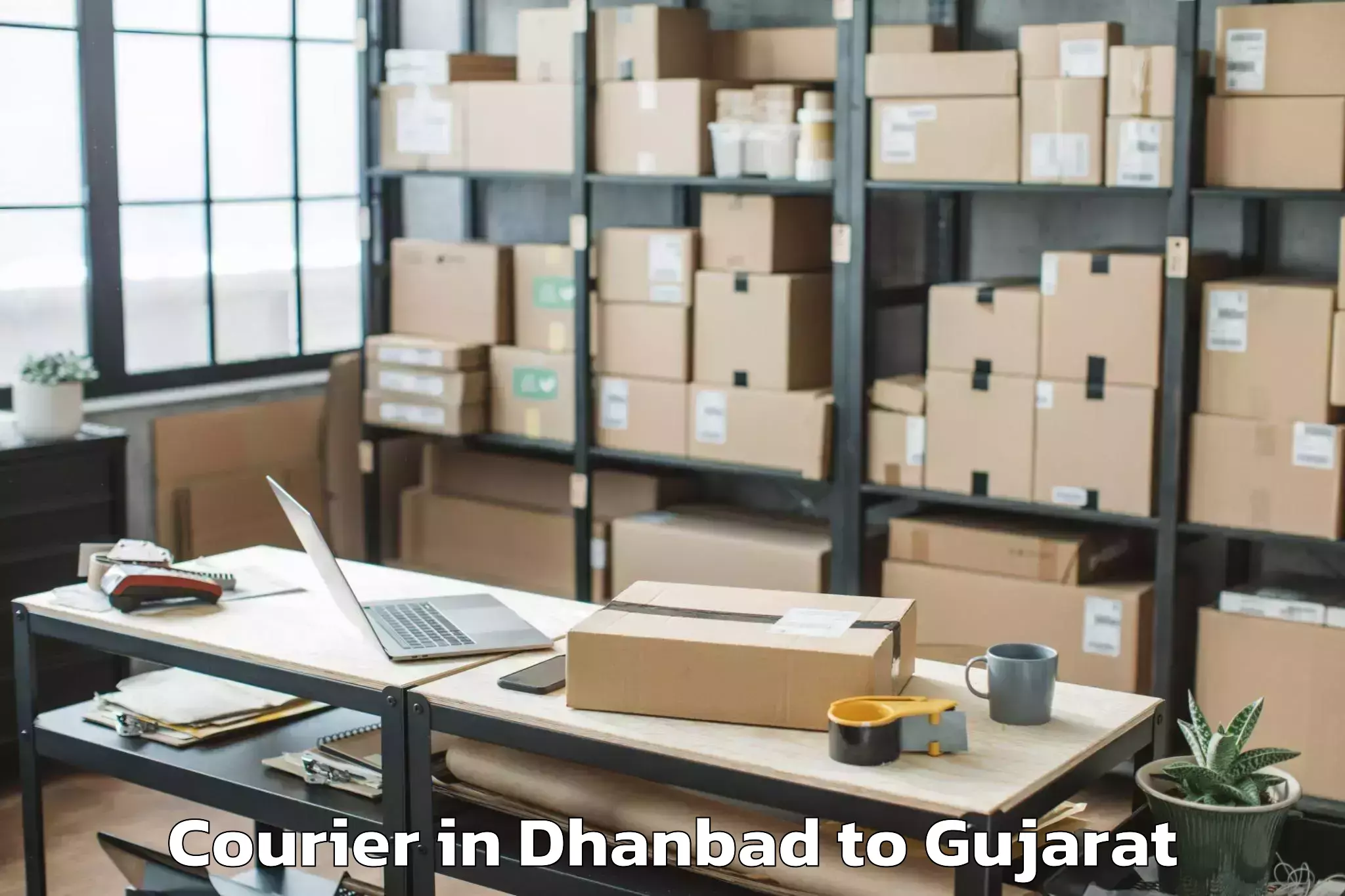 Hassle-Free Dhanbad to Madhav Kampo Courier